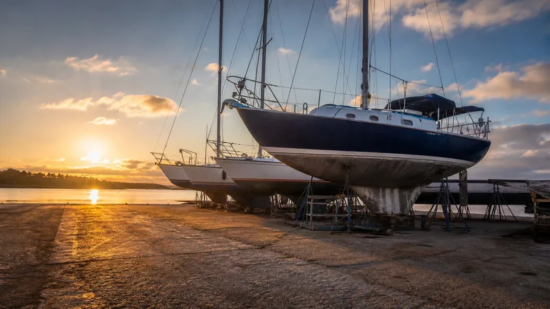 Working harbor with moored fishing boats and stacked crab pots at dawn, How to Start an Oyster Farm in Virginia